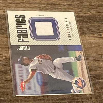 2006 Fleer Fabrics  #FF-PM Pedro Martinez Game Worn Jersey Card - Image 1 of 4