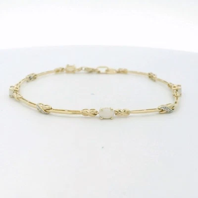 Brazalete de ópalo de eslabones de barra de oro amarillo de 10k - 7,5" (C31012334) Foto 1 de 4