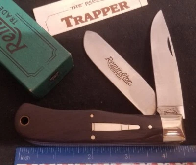 Faca Remington UMC R1128 Trapper Siver Bullet, alças de madeira Cocobolo " - Imagem 1 de 4