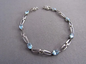 PULSERA TENIS RETRO VINTAGE DE TOPACIO AZUL OVALADO ESTERLINA - Imagen 1 de 4