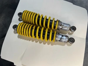 SUZUKI LT250R QUADRACER oem FRONT SHOCK ABSORBERS SHOCKS 1985 1986 yellow - Picture 1 of 3