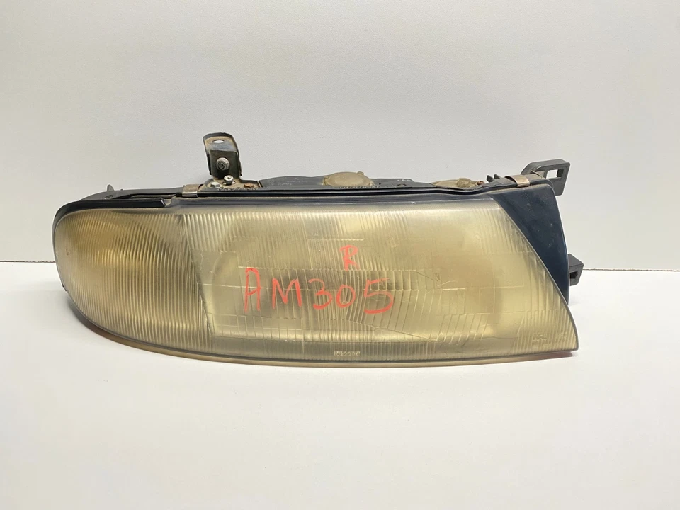 Faro delantero derecho Nissan Altima 1993-1997 OEM, 114-58339 Foto 1 de 4