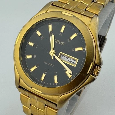 Reloj de Cuarzo Lorus Hombre Tono Dorado Negro Esfera Militar Día Fecha Batería Nueva 6.75" Foto 1 de 4