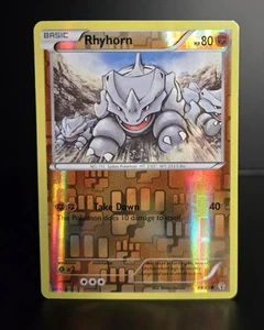 Pokémon TCG - RHYHORN - 49/83 - REVERSE HOLO - XY GENERATIONS (2016) - MP/LP - Picture 1 of 3