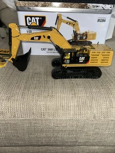 DIECAST MASTERS - CATERPILLAR 390F LE Bagger mit Fahrer und Metallbox 1.50 - Bild 1 von 11