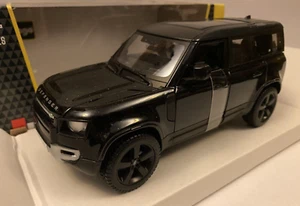 Land Rover Defender 1:24 Black by Burago - Picture 1 of 4