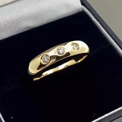 Alianza de diamantes oro de 9 quilates 3,55 gramos 0,15 quilates 3 diamantes reales 3 mm de ancho talla L Foto 1 de 3