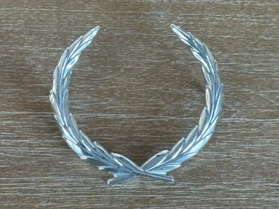 Cadillac Brougham Fleetwood 1985-1992 techo corona emblema nuevo de stock Foto 1 de 4