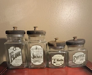 4 VTG GLASS CANISTERS, WOOD LID APOTHECARY SJL PROD.~Flour, Sugar, Tea, Coffee - Picture 1 of 7