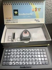 CRICUT CARTRIDGE- DOODLECHARMS - w/ overlay, booklet, & box - Picture 1 of 5