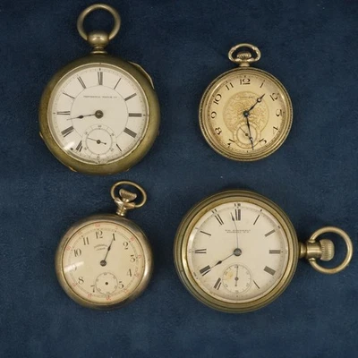 Lot of 4 Open Face Pocket Watches W Silveroid Cases for Parts /Repair - Image 1 of 4