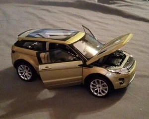 Welly Land Rover Range Rover Evoque Metallic Green 1:24 Diecast Model Car  - Picture 1 of 7