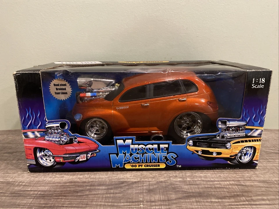 Muscle Machines 1:18 2000 PT Cruiser Metallic Orange - Image 1 of 4