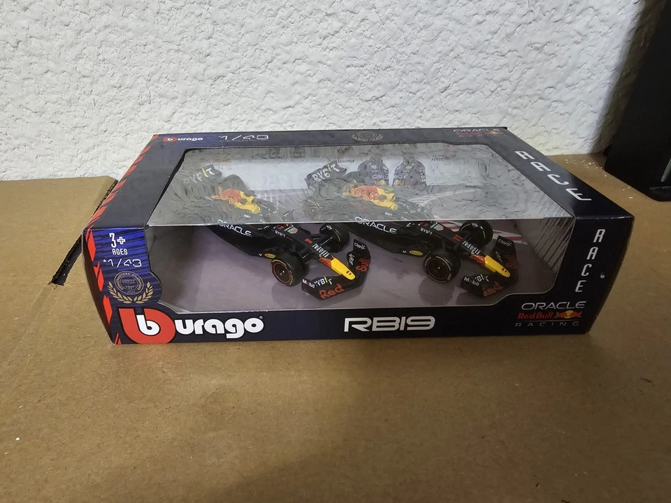 burago  Max Verstappen & Sergio Perez  1/43 Formula 1 F1  Red Bull Racing  RB19 - Image 1 of 4
