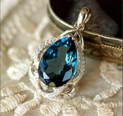 Colgante lágrima diamante topacio azul Londres corte pera de 4,30 quilates acabado oro blanco de 14 quilates Foto 1 de 4