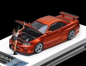 NISSAN Skyline GT-R (R34) Z-Tune + Figura - Arancione - Time Micro 1:64 - Foto 1 di 6
