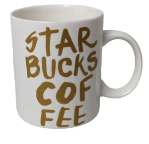 STARBUCKS Coffee 2015 Gold White Mug 12 Oz Spell Out Text Graffiti - Picture 1 of 9