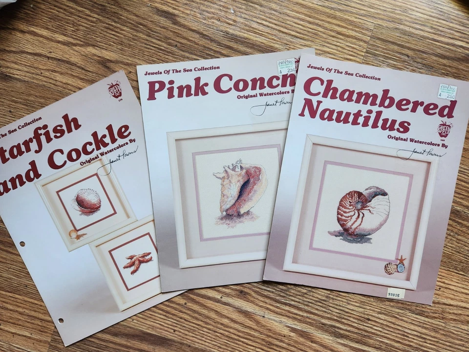 3 cross stitch charts by Janet Powers, Pink Conch, Nautilus, Starfish, Cockle - Image 1 of 1
