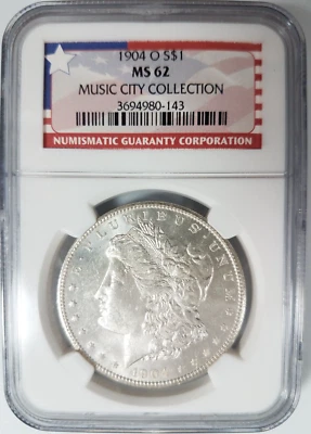 Dólar de plata O Morgan 1904 NGC MS 62 Music City Collection Tennessee Pedigree Foto 1 de 4