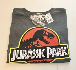 NWT JURASSIC WORLD Park Logo T Rex Dinosaur Charcoal Gray Unisex T Shirt Size XL - Picture 1 of 15