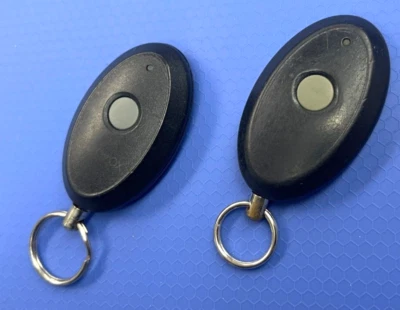 PAIR OF AUDIOVOX KEYLESS REMOTE START FOB CLICKER TRANSMITTER ELVATCC AVX-1B4S - Image 1 of 2