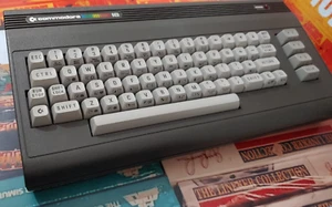 Ordenador Commodore C 16 1985 (modded 16k/64k) con PA (Netzteil) y TV Cable - Imagen 1 de 6