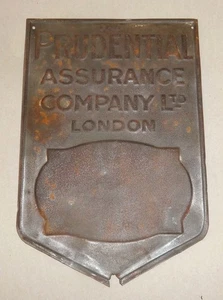 Letrero de seguro de colección PRUDENTIAL ASSURANCE COMPANY LONDRES ΤΙΝ EN RELIEVE AÑOS 30 ¡RARO! - Imagen 1 de 5