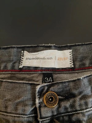 Pantalones cortos de mezclilla de papel para hombre talla 34 bolsillos de dinosaurio Tyler tiro bajo Foto 1 de 4