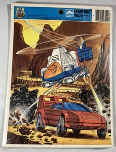 GOBOTS Cop-Tur & Turbo DE COLECCIÓN NUEVO SELLADO 8x11 Marco Bandeja Rompecabezas 1985 DORADO - Imagen 1 de 3