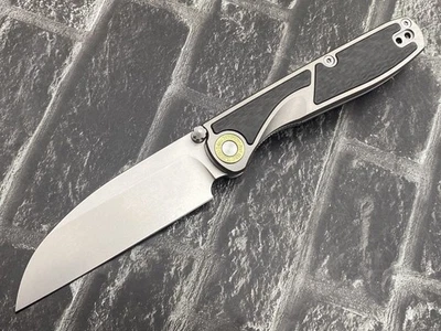 Cuchillo de bolsillo Twosun TS577-K110-CF K110 hoja mango titanio/CF Foto 1 de 4