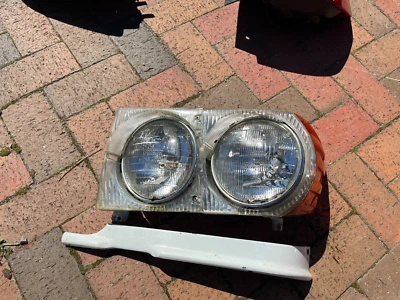 1972-1980 Mercedes 380SL 450SL 380SLC 450SLC Left Headlight & Lower Trim - Image 1 of 4