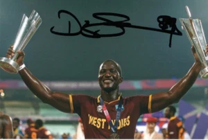 WEST INDIES CRICKET: DARREN SAMMY SIGNED 6x4 TWENTY20 TROPHIES ACTION PHOTO+COA - Picture 1 of 1