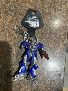 Universal Studios Transformers Optimus Prime Keychain 2018 Broken - Picture 1 of 3