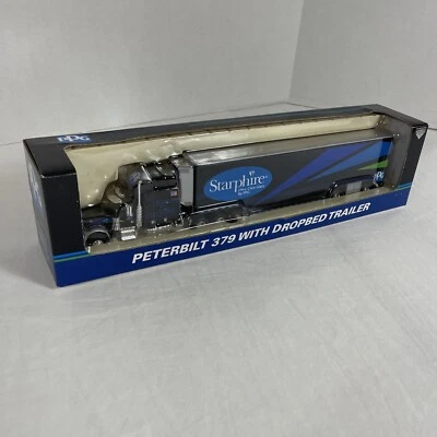SpecCast 32905 PPG Starphire 1:64 Peterbilt 379 W/ Dropbed Trailer Die Cast - Image 1 of 4