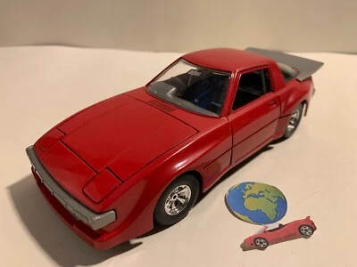Bburago Mazda RX-7, automodello scala 1:24 - 1:25, vintage (1226) - Immagine 1 di 4