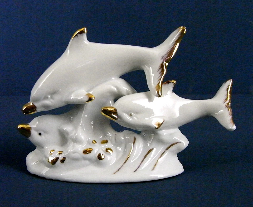 3 Springende Delphine Porzellan Modell weiß gold Tümmler 5 x 9 x 13cm neu - Bild 1 von 1
