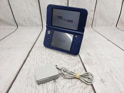 Nintendo *Nuevo* 3DS XL Galaxy Edition con fuente de alimentación, buen estado  Foto 1 de 4