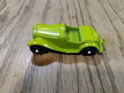 Coche de juguete diecast vintage TootsieToy verde convertible MG Roadster V 8 Foto 1 de 4
