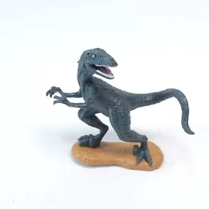 Figura de dinosaurio TM & UNI Velociraptor - Imagen 1 de 4