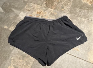 Pantalones cortos para correr NIKE DRI-FIT talla XS negros elásticos cintura cordón - Imagen 1 de 5
