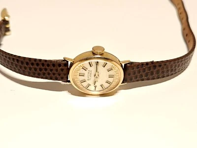 ВИНТАЖНЫЕ МАЛЕНЬКИЕ ОВАЛЬНЫЕ РОСКОШНЫЕ ПОЗОЛОЧЕННЫЕ ЖЕНСКИЕ МЕХАНИЧЕСКИЕ ЧАСЫ ГЕРМАНИЯ «BIFORA» - Изображение 1 из 4