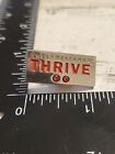 Silver tone Shelf Reliance Pin Thrive with two red stones qg