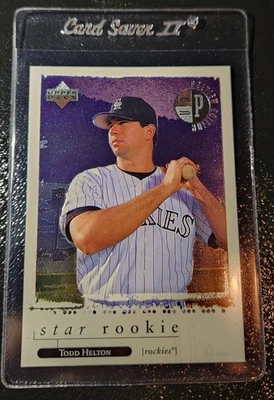 1998 TODD HELTON RC UPPER DECK PREVIEW EDITION #4 OF 10 ROCKIES HOLOFOIL  - Image 1 of 2