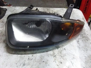 Driver side Headlight Fits 03-05 CAVALIER 3369855 OEM #471 - Picture 1 of 2