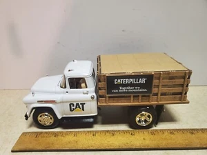 1996 Ertl 1/25 Scale Diecast Caterpillar' 1957 Chevy Stake bed Truck New In Box - Picture 1 of 8