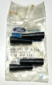4 Genuine Ford 1-1/4" (1.25") Tire Valve Stem Extension Caps NOS D8BZ-1705-A - Picture 1 of 2