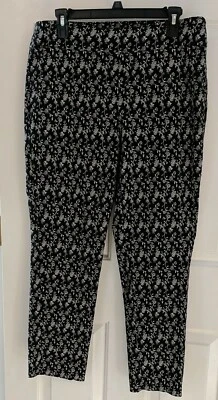 Pantalones elásticos negros con estampado floral Counterparts para mujer talla 14 usados Foto 1 de 4