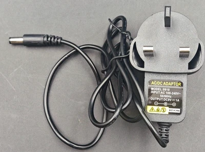 9V 1A 9W AC-DC Adapter Power Supply Charger for Model 0910 UK Plug 5.5mm * 2.1mm - Image 1 of 3