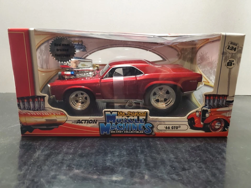 Muscle Machines 1966 '66 Pontiac GTO 1:24 Scale Diecast Car 71125 - Image 1 of 4