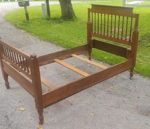 ANTIQUE LOVELY BED.  bed frame  3/4 size USE AS A FULL. FUTON ON TOP ALSO Cover